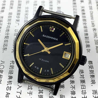 37mm Shanghai manual mechanical watch with single calendar, black dodecagonal case and classic leather strap.