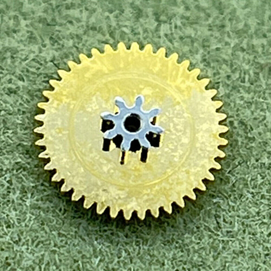 Ratchet wheel for SA100 watch movement, precise generic replacement part for watch repair.