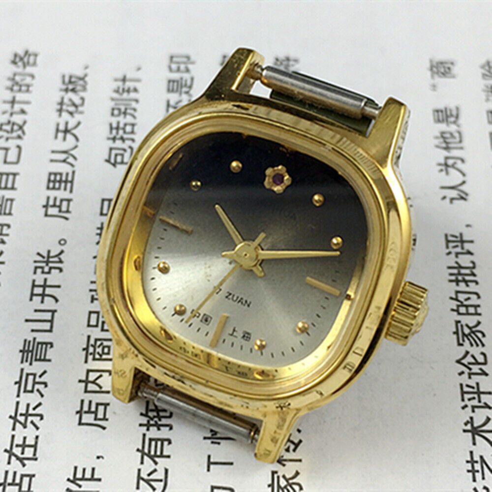 Golden 23mm Shanghai Lady Watch with square case, 17 jewels, manual mechanical movement by Shanghai Brand.