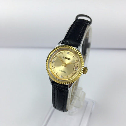HAIDA 23mm gold manual mechanical lady watch with 17 jewels and round golden case, elegant design.