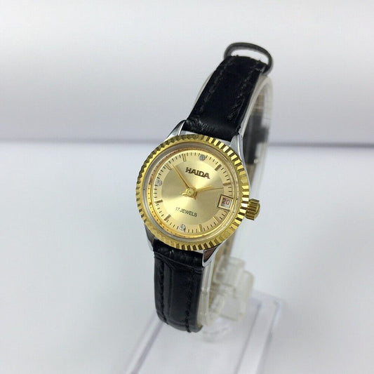 HAIDA 23mm gold manual mechanical lady watch with 17 jewels and round golden case, elegant design.