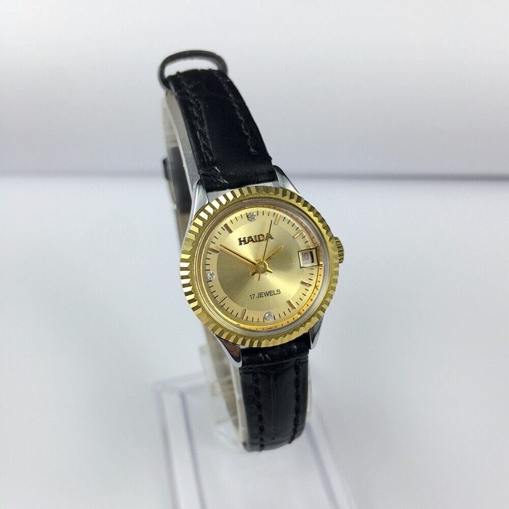 HAIDA 23mm gold ladies manual watch with 17 jewels, round case, elegant style for daily wear.