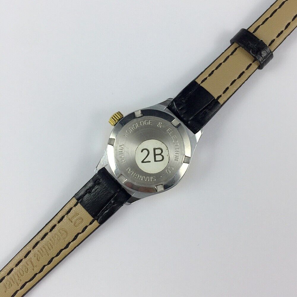 HAIDA 23mm gold manual mechanical lady watch with 17 jewels, round golden case, elegant design for stylish wear.