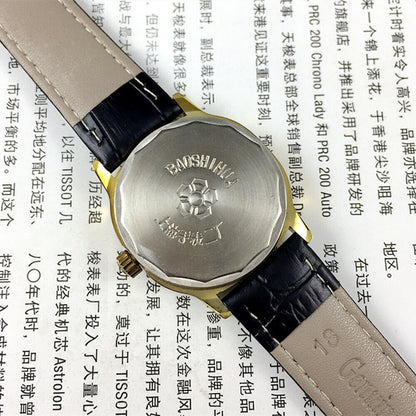 34mm Shanghai watch with green dial, golden markers, manual mechanical movement, 17 jewels craftsmanship.