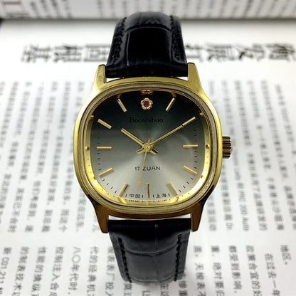 34mm Shanghai manual mechanical watch with golden markers, green dial, round case, 17 jewels craftsmanship by Shanghai.