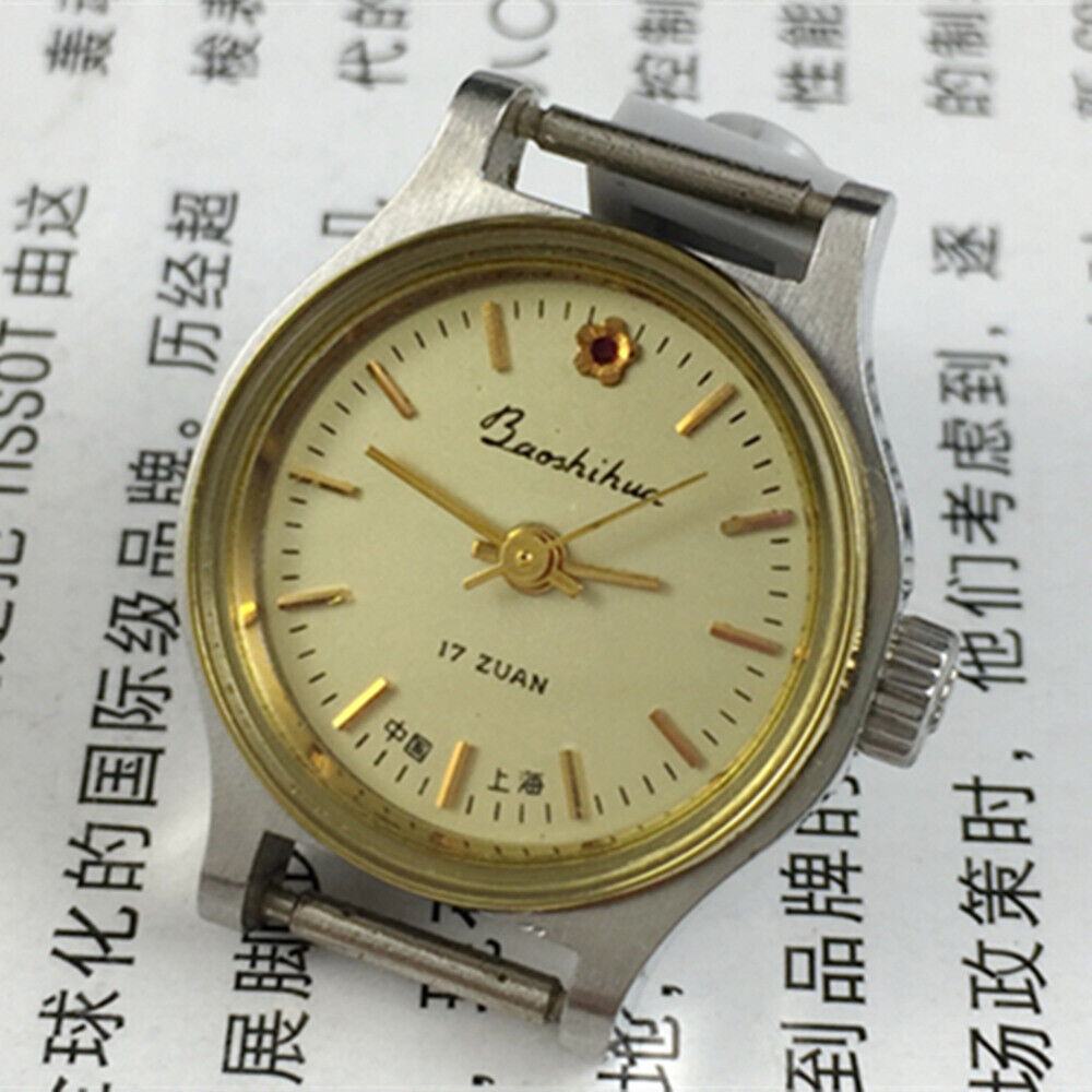 23mm Shanghai Lady Watch with golden nail markers and round golden case, manual mechanical movement.