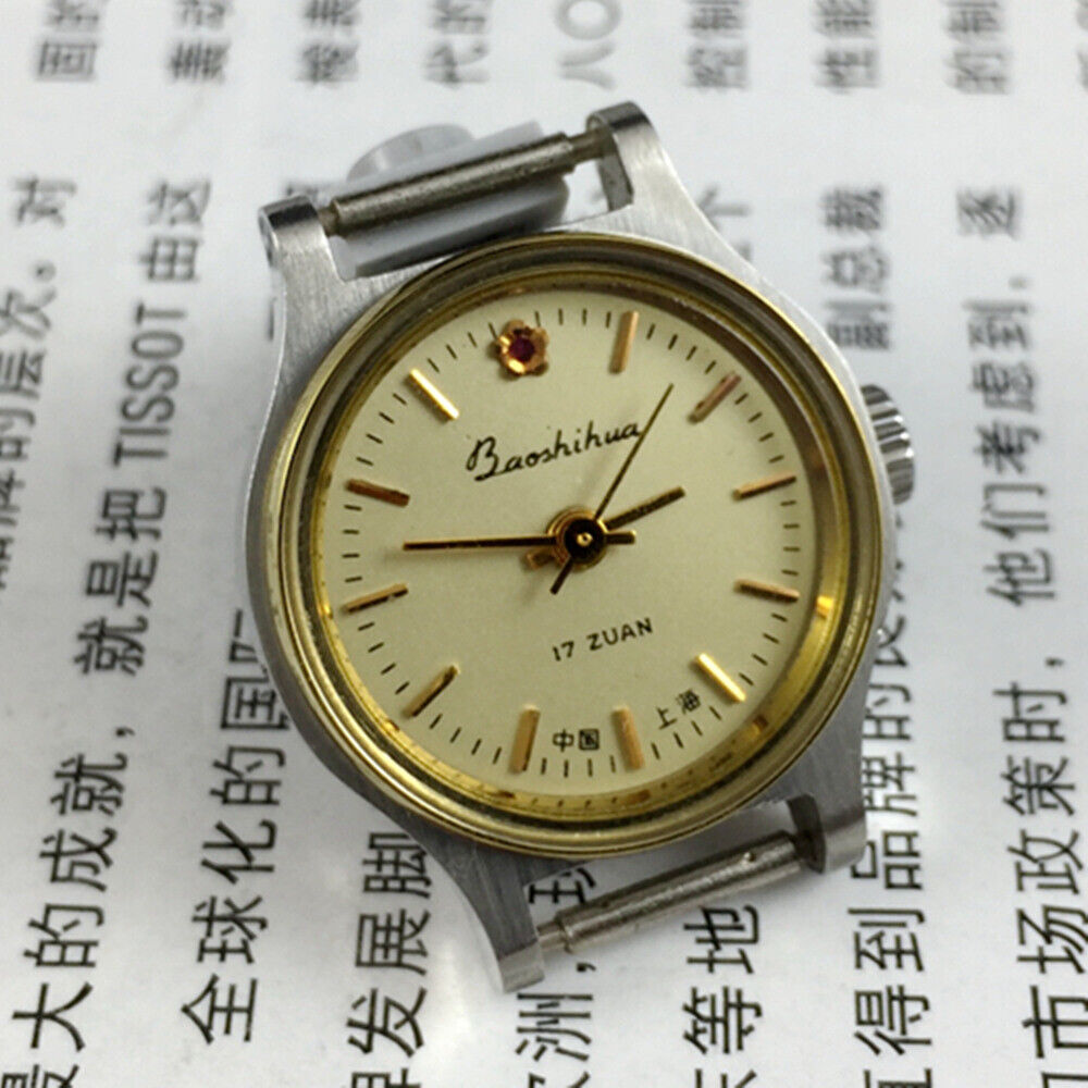 23mm Shanghai Lady Watch with golden nail markers and round golden case, manual mechanical movement.