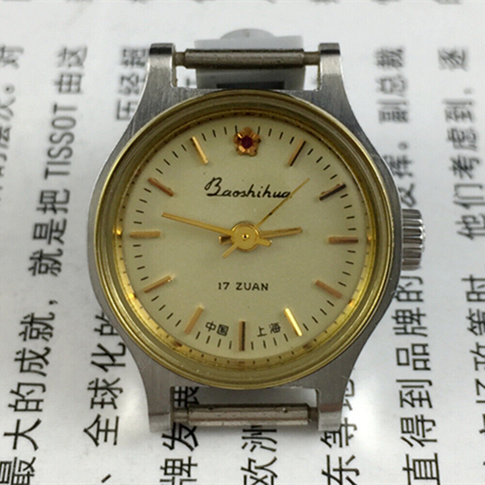 23mm Shanghai Lady Watch with golden nail markers and round golden case, manual mechanical movement by Shanghai.