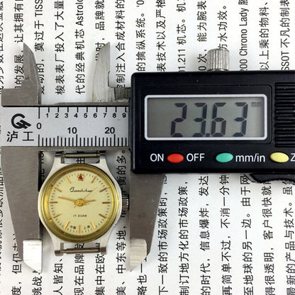 23mm Shanghai Lady Watch with golden nail markers, round case, manual mechanical movement, elegant design.