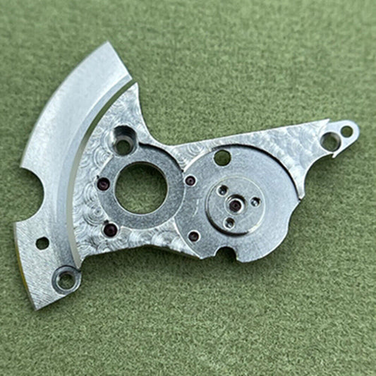 Automatic wheel bridge for SA100 watch movement, durable repair part for precise timekeeping.