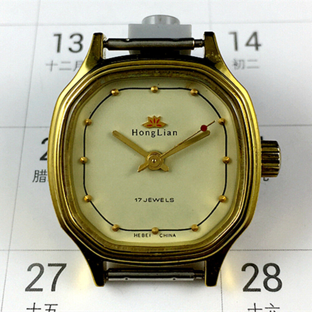Elegant 27mm HONGLIAN manual mechanical lady watch with golden nail markers and octagonal golden case.