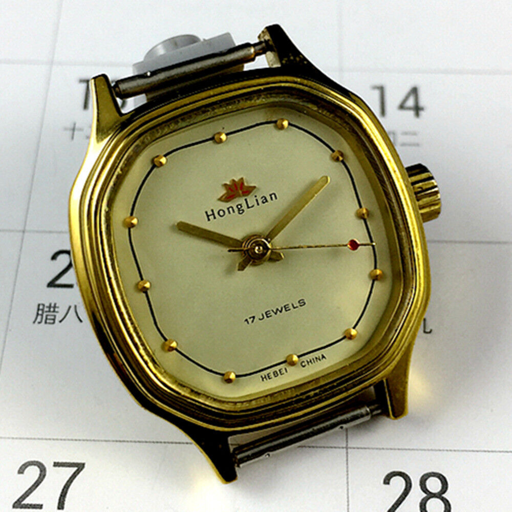 HONGLIAN 27mm manual mechanical lady watch with octagonal gold case and golden nail markers.