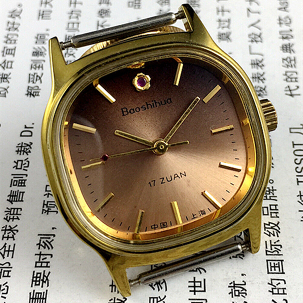 Shanghai 33mm manual mechanical watch with 17 jewels, golden nails, square case, and brown dial for elegant style.