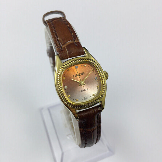 22mm HAIDA Lady Watch with golden nail accents, manual mechanical movement, and gradient orange dial.