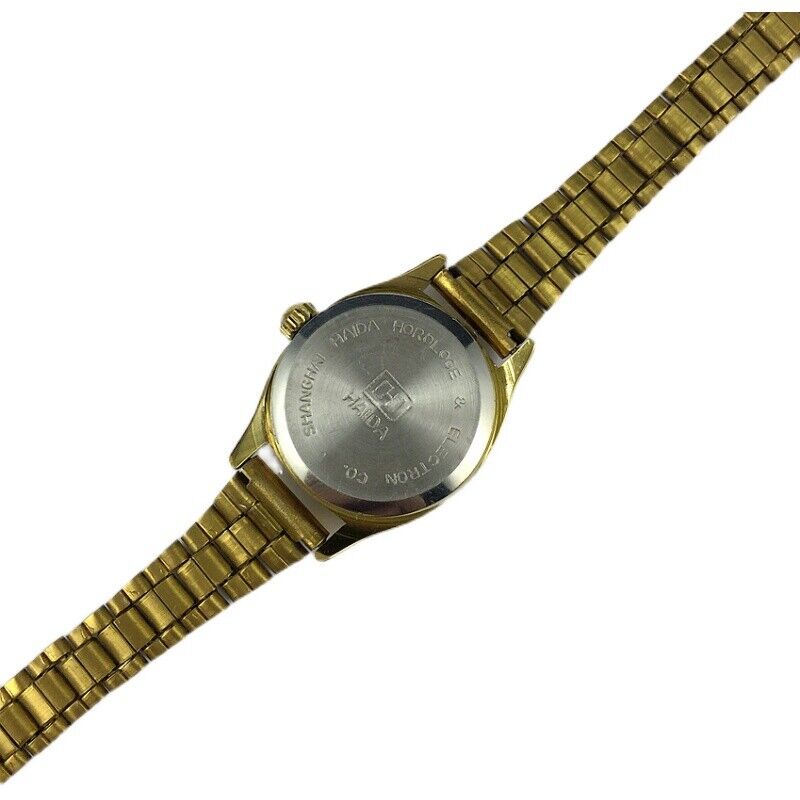 HAIDA 22mm Lady Watch with golden nail markers, manual mechanical movement, and gradient orange dial.