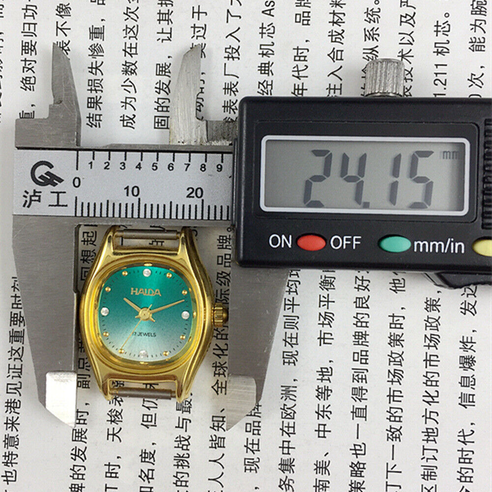 HAIDA 24mm Lady Watch with golden nail design, 17 jewels, manual movement, gradient green dial.