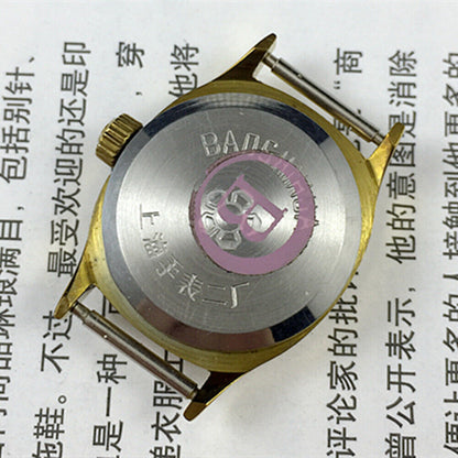 Montre mécanique manuelle Shanghai pour femme, cadran jaune à clous dorés, boîtier ovale, 17 pouces