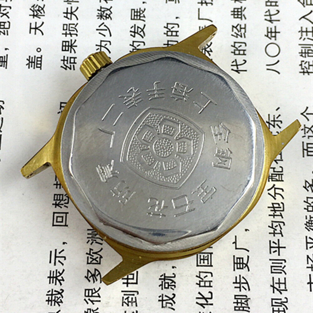 33mm Shanghai watch with golden nail markers, 17 jewels, square case, vibrant orange dial, classic style.