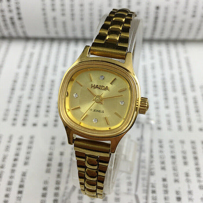24mm HAIDA gold mechanical ladies watch with imitation diamonds, elegant design for stylish and formal occasions.