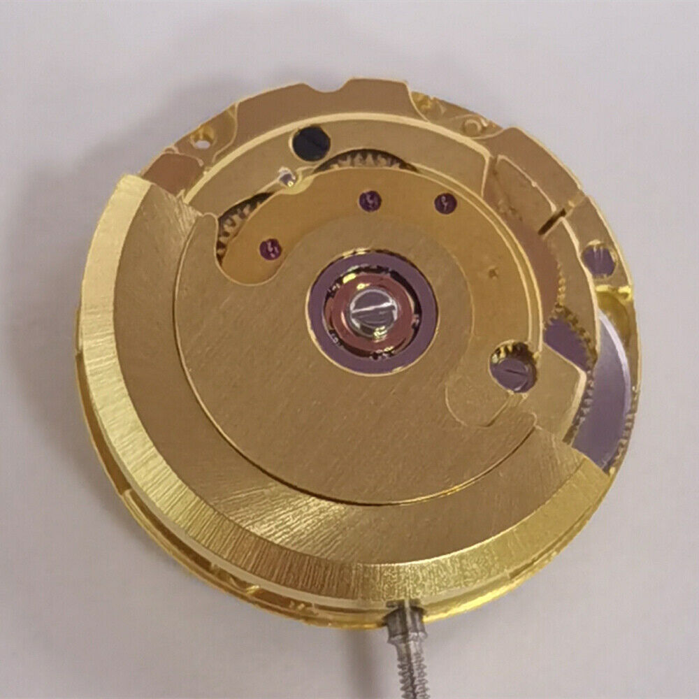 Golden mechanical watch showcasing date at 3 o'clock, ETA2671 movement, precision craftsmanship.