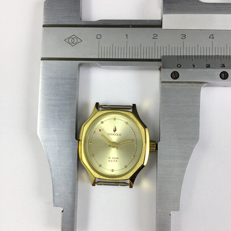 28mm Dandong Made Kongque lady mechanical watch with 19 jewels and gold dial, elegant timepiece.