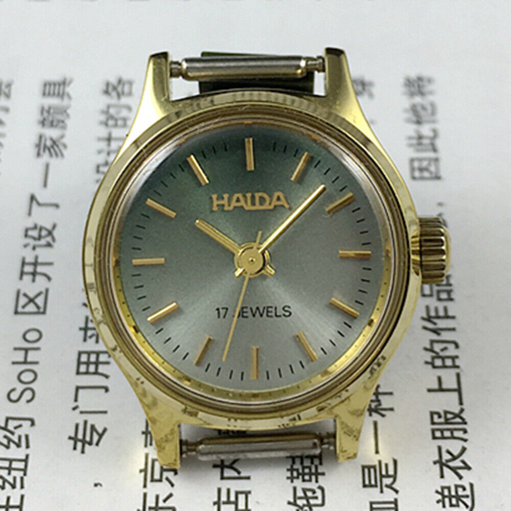 23mm SHANGHAI HAIDA lady watch with golden nails and blackish green dial, manual mechanical movement.