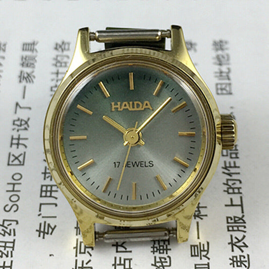23mm SHANGHAI HAIDA lady watch with golden nails and blackish green dial, manual mechanical movement.