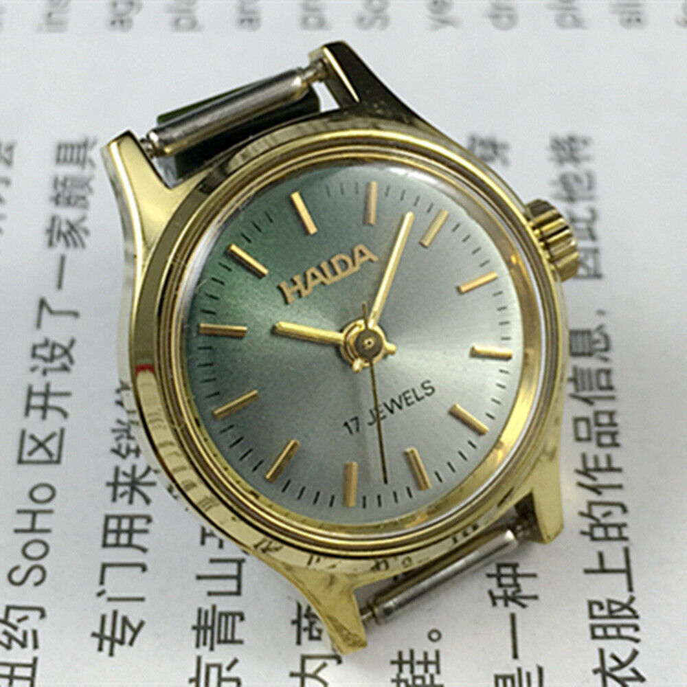 23mm SHANGHAI HAIDA lady watch with golden nails and blackish green dial, manual mechanical movement.