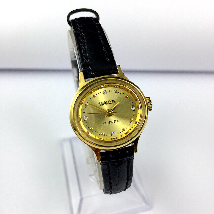 Elegant 24mm HAIDA mechanical ladies watch with oval golden case and imitation diamond accents, perfect for stylish occasions.