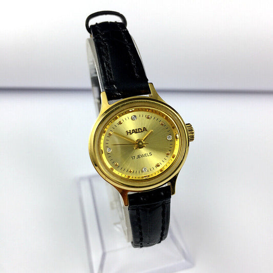 Elegant 24mm HAIDA mechanical ladies watch with oval golden case and imitation diamond accents, perfect for stylish occasions.