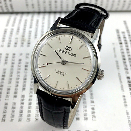 Beijing 36mm Double Rhomb watch with silver case and silver nail straps, manual mechanical movement, elegant design.