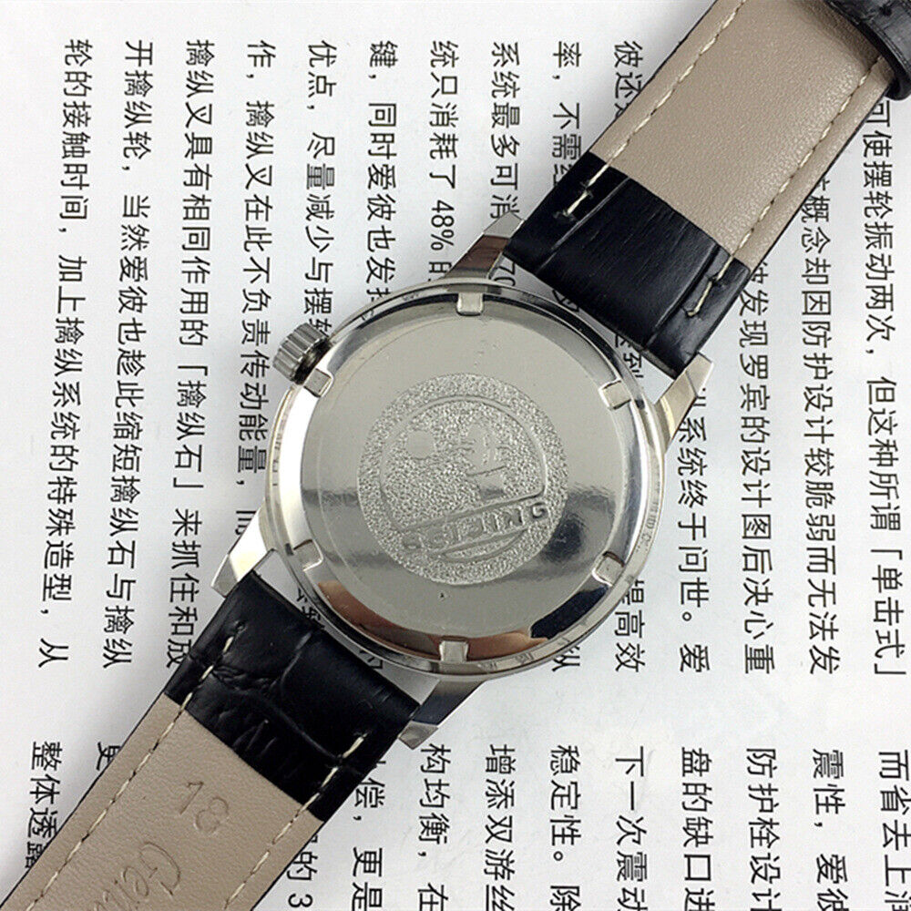 Beijing 36mm Double Rhomb watch with silver case and silver nail straps, manual mechanical movement, elegant style.