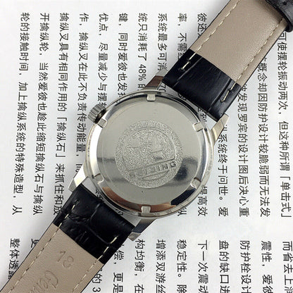 Beijing 36mm Double Rhomb watch with silver case and silver nail straps, manual mechanical movement, elegant style.
