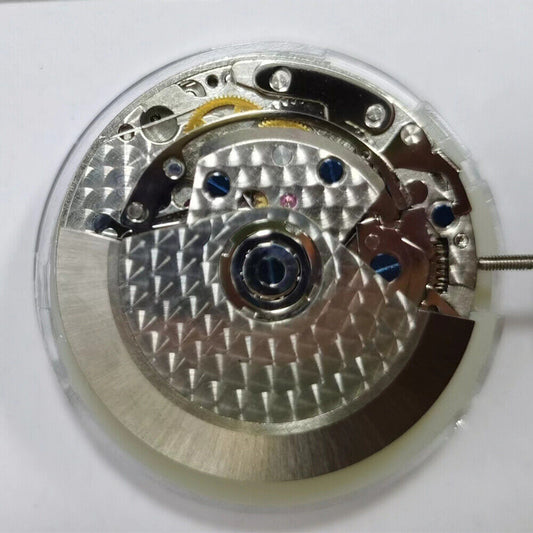 China Made 7750 White mechanical watch movement with single calendar and small seconds at 3, 6, and 9 o'clock.