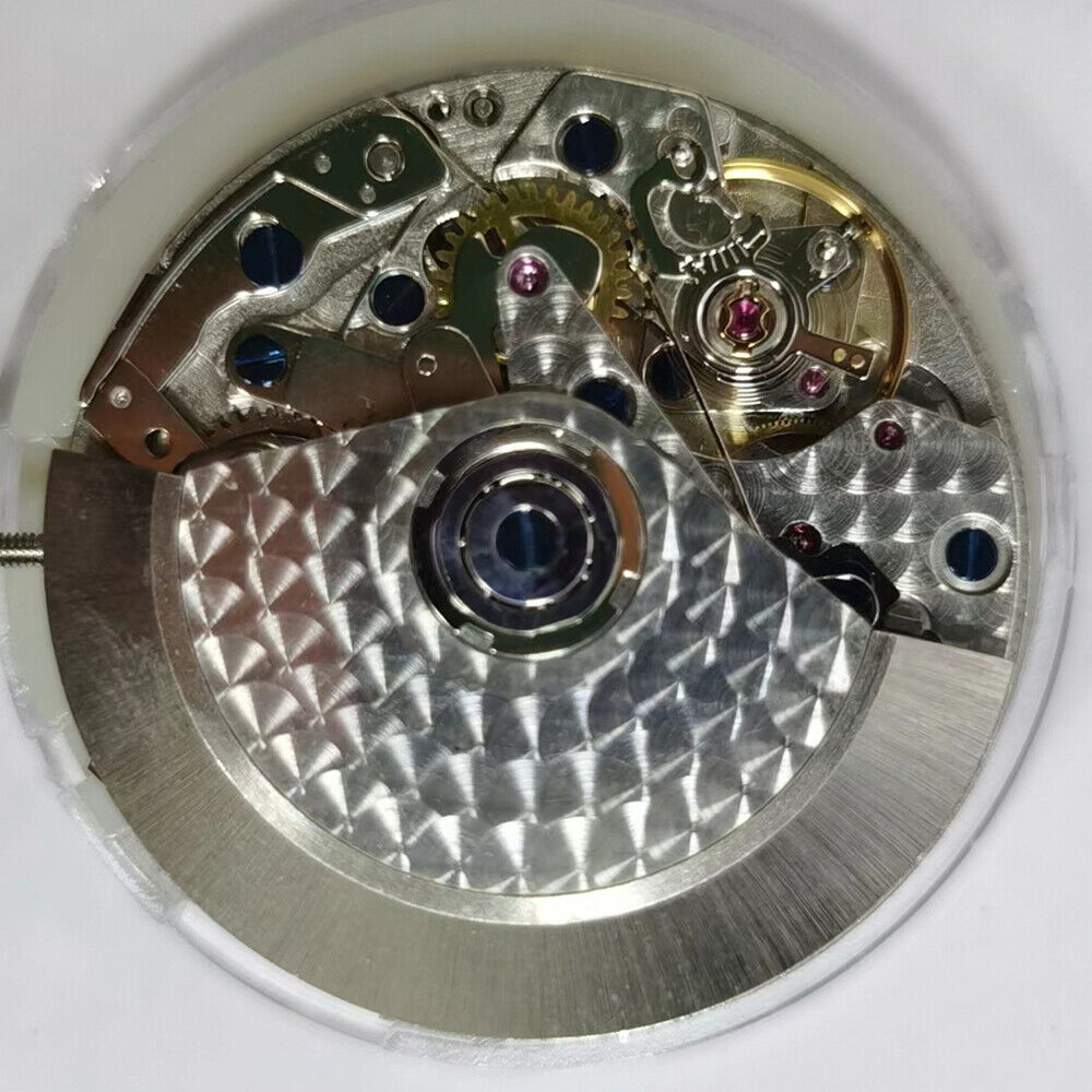 White China Made 7750 mechanical watch movement with single calendar and small seconds at 3, 6, and 9 o'clock.