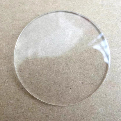 Set of 5 round single dome watch glass crystals, 25-35mm diameter, 1.5-2.5mm thick, ideal for watch repair accessories.