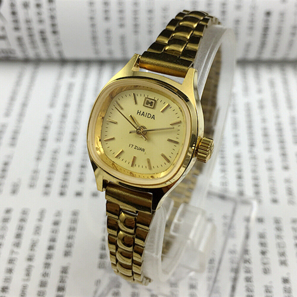 Elegant 24mm Shanghai Haida lady watch with golden nail accents and square mechanical case.