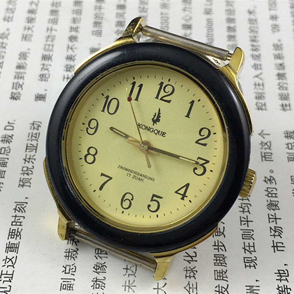 36mm Kongque Peacock manual watch with 17 jewels, black leather band, classic elegance.