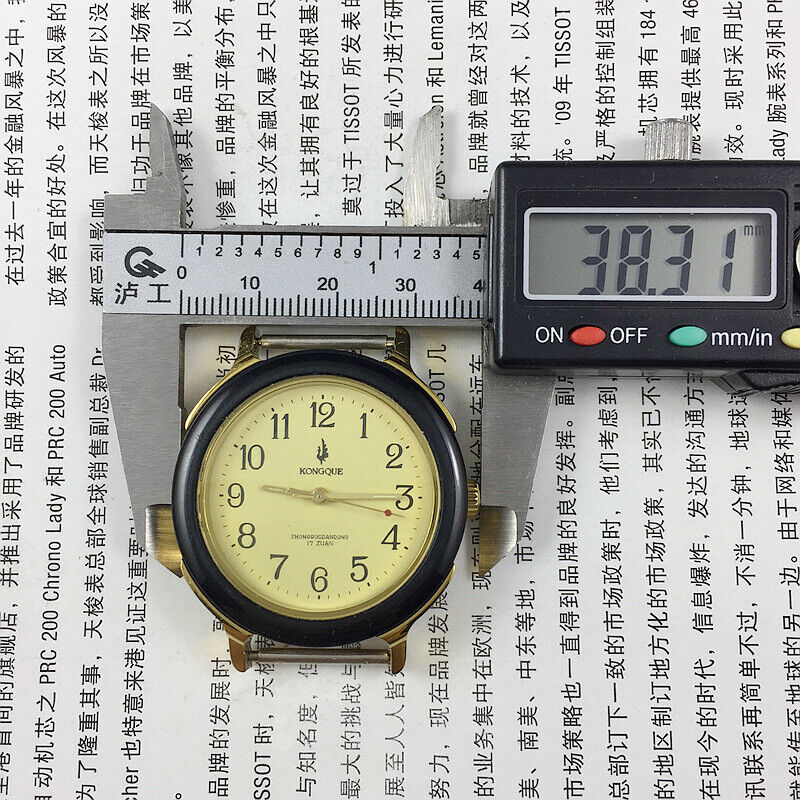 36mm Kongque Peacock manual watch with 17 jewels, black leather band for timeless elegance and classic style.