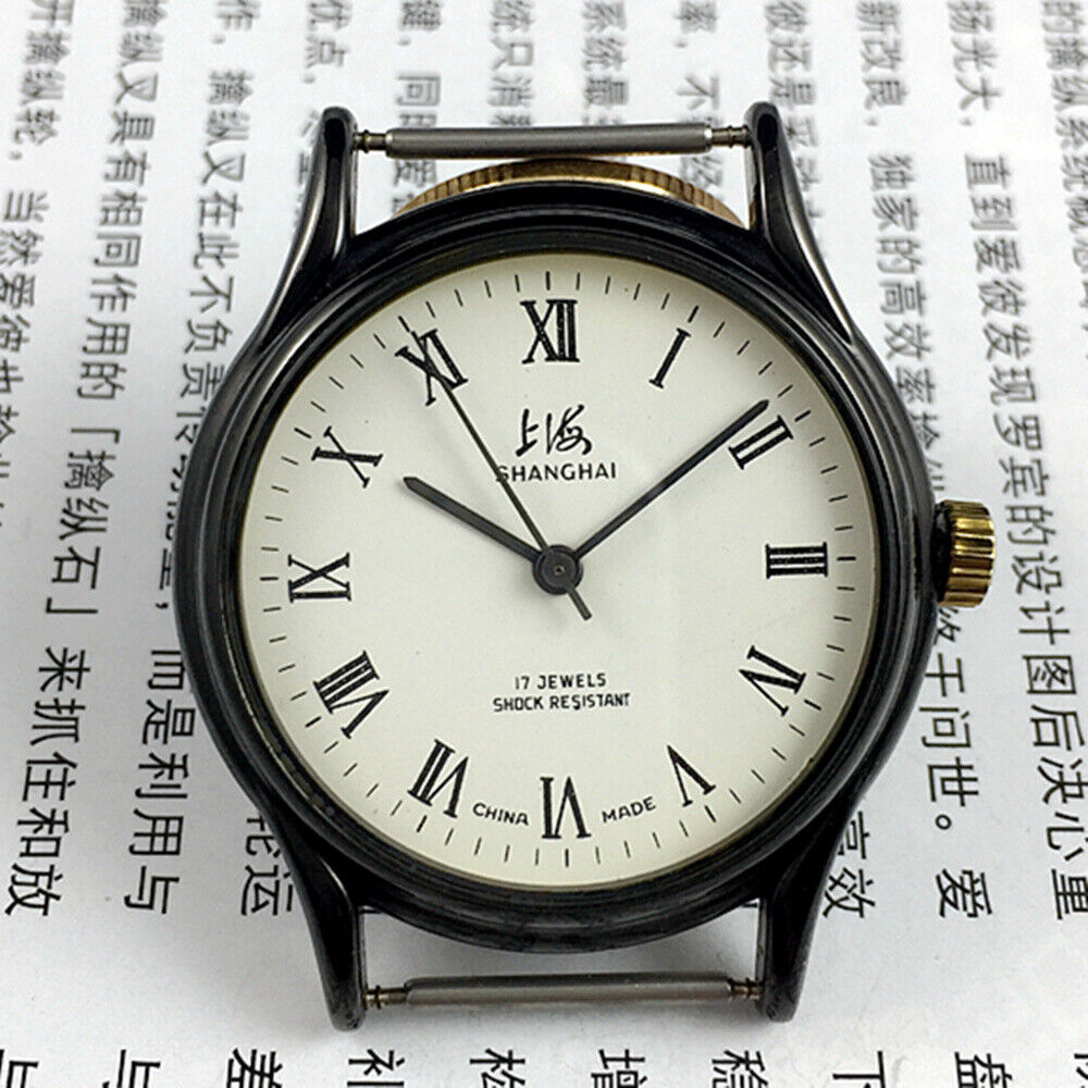 37mm Shanghai Factory manual mechanical watch with Roman numerals, 17 jewels, classic design.