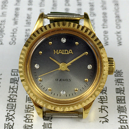 24mm Shanghai Haida manual mechanical lady watch with 17 jewels and imitation diamond markers.
