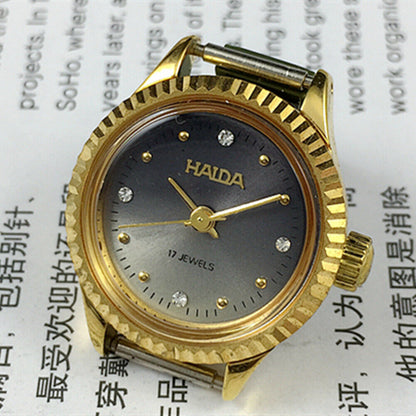 24mm Shanghai Haida ladies watch with manual mechanical movement, 17 jewels, and imitation diamond markers.