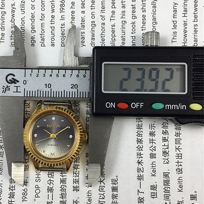 24mm Shanghai Haida ladies manual watch with 17 jewels and sparkling diamond-like markers.