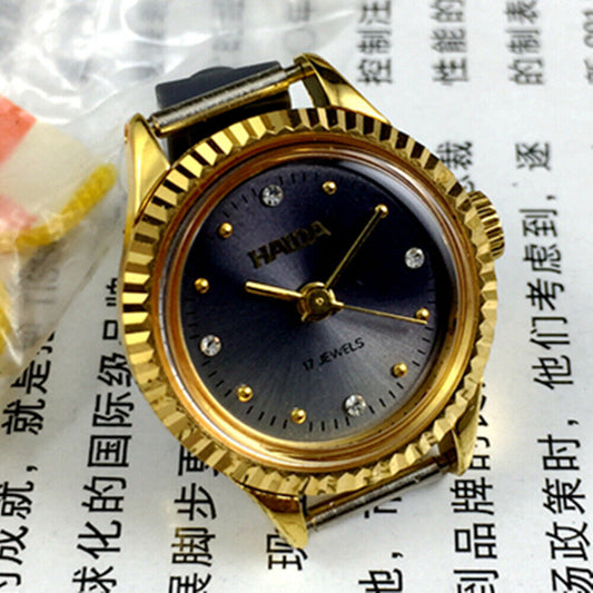 Elegant 24mm HAIDA mechanical lady watch with golden nail markers, grey dial, and 17 jewel movement in a round case.