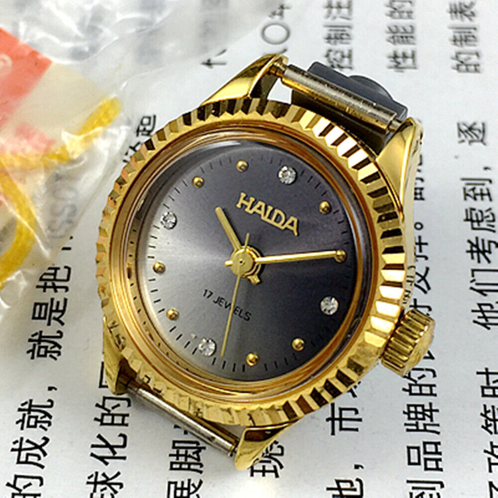 HAIDA 24mm mechanical lady watch with golden nail markers and grey dial, 17 jewel movement, round case.