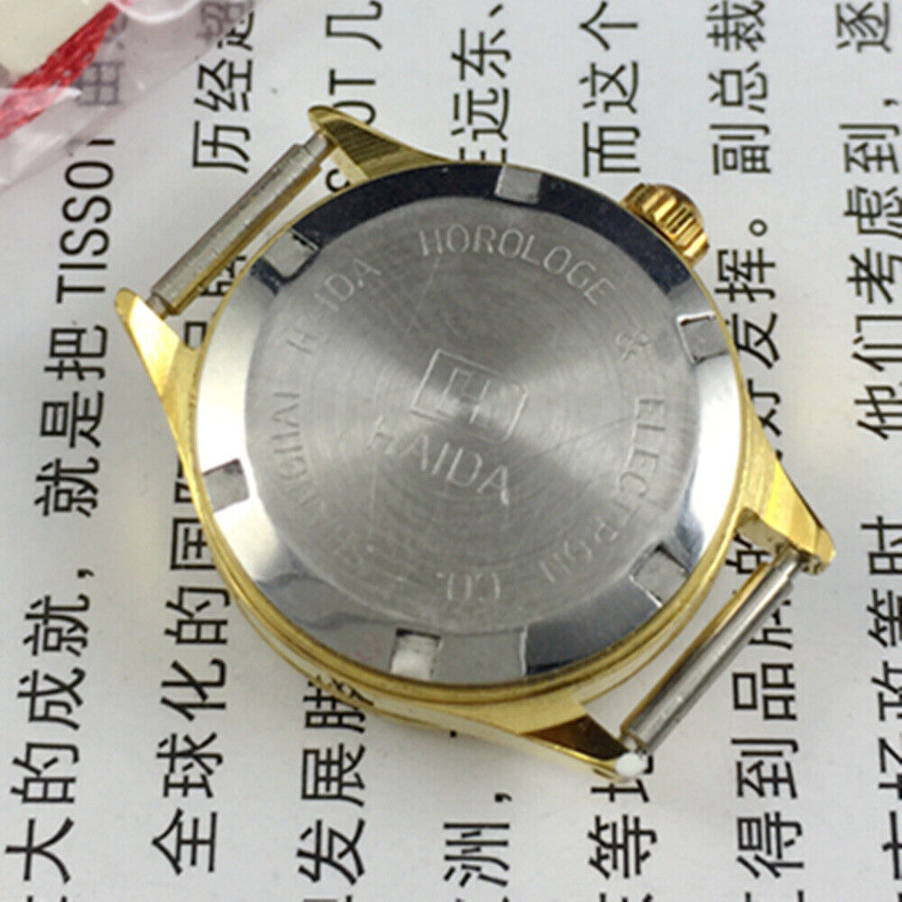 HAIDA 24mm mechanical lady watch with golden markers, grey dial, 17 jewel movement, elegant round case.