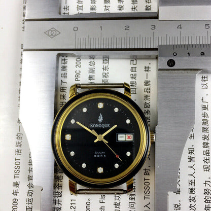 Kongque 37mm automatic watch with black dial, double calendar, and 33 jewels for precise timekeeping.