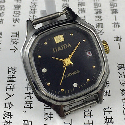 Elegant manual mechanical lady watch with octagonal case, imitation diamonds, 17 jewels for formal occasions.