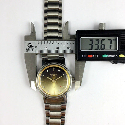 China Kongque Steel manual watch with 17 jewels, golden brown dial, elegant design for classic style.