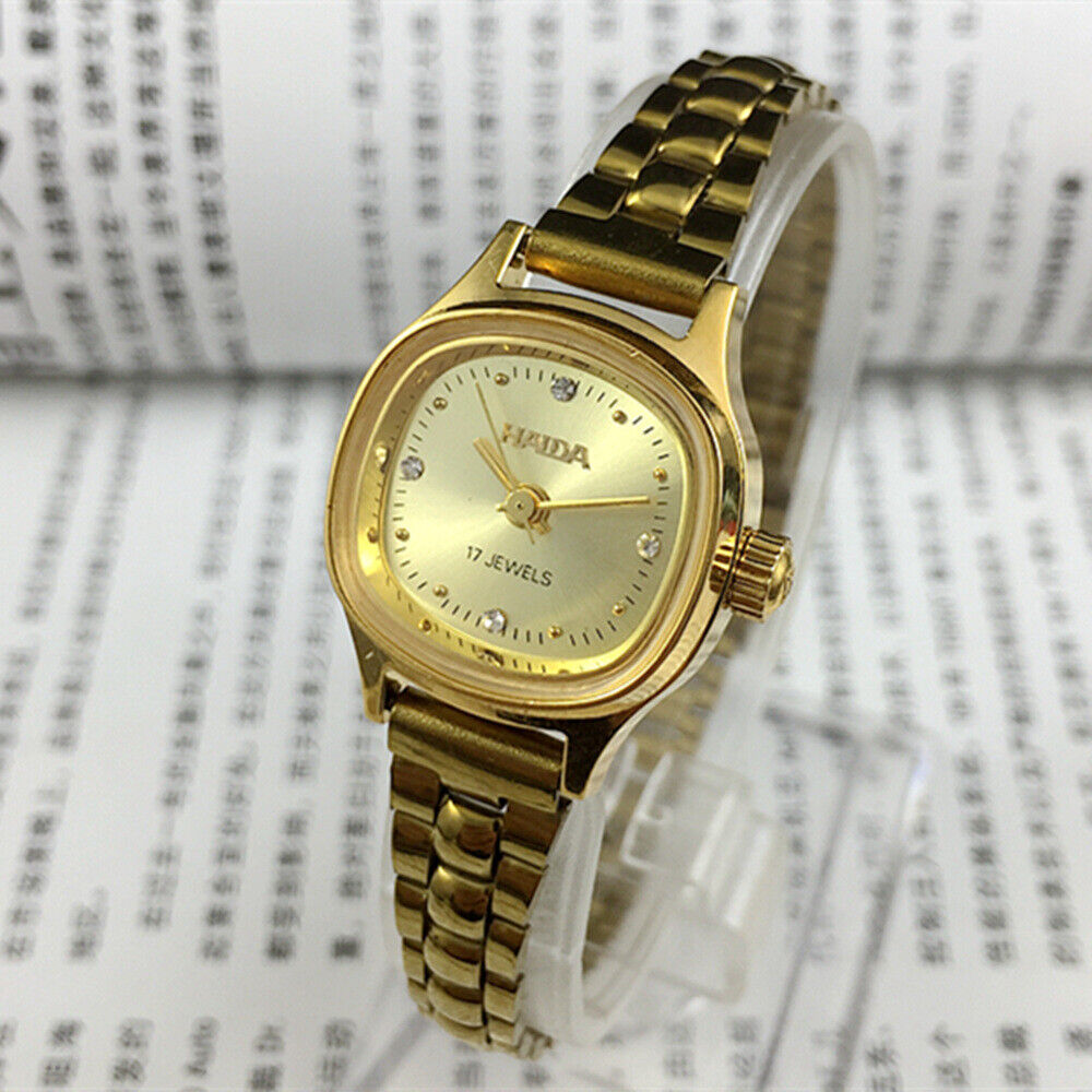24mm SHANGHAI HAIDA lady watch with golden nail markers and champagne dial, manual mechanical movement.